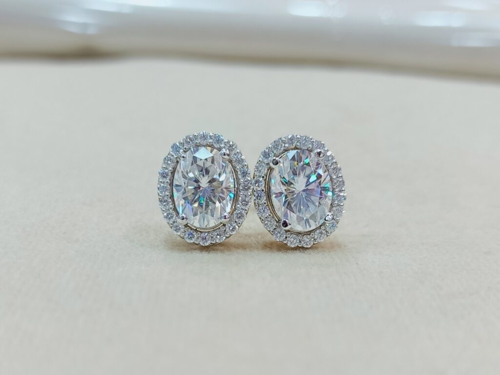 Natural Diamond Stud Earrings Oval 0.75 ct. tw. (I-J, I1) 14k White Gold  4-Prong Basket - DiamondStuds.com